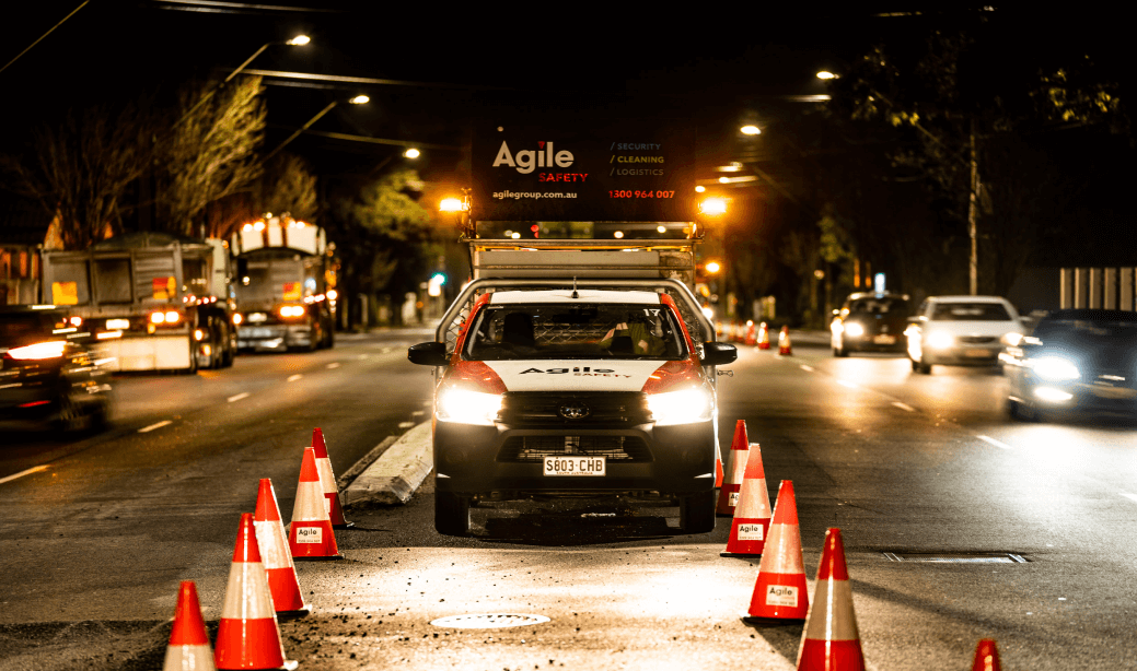 Agile Safety - Vehicle with Agile Safety logo moves forward on a dark road